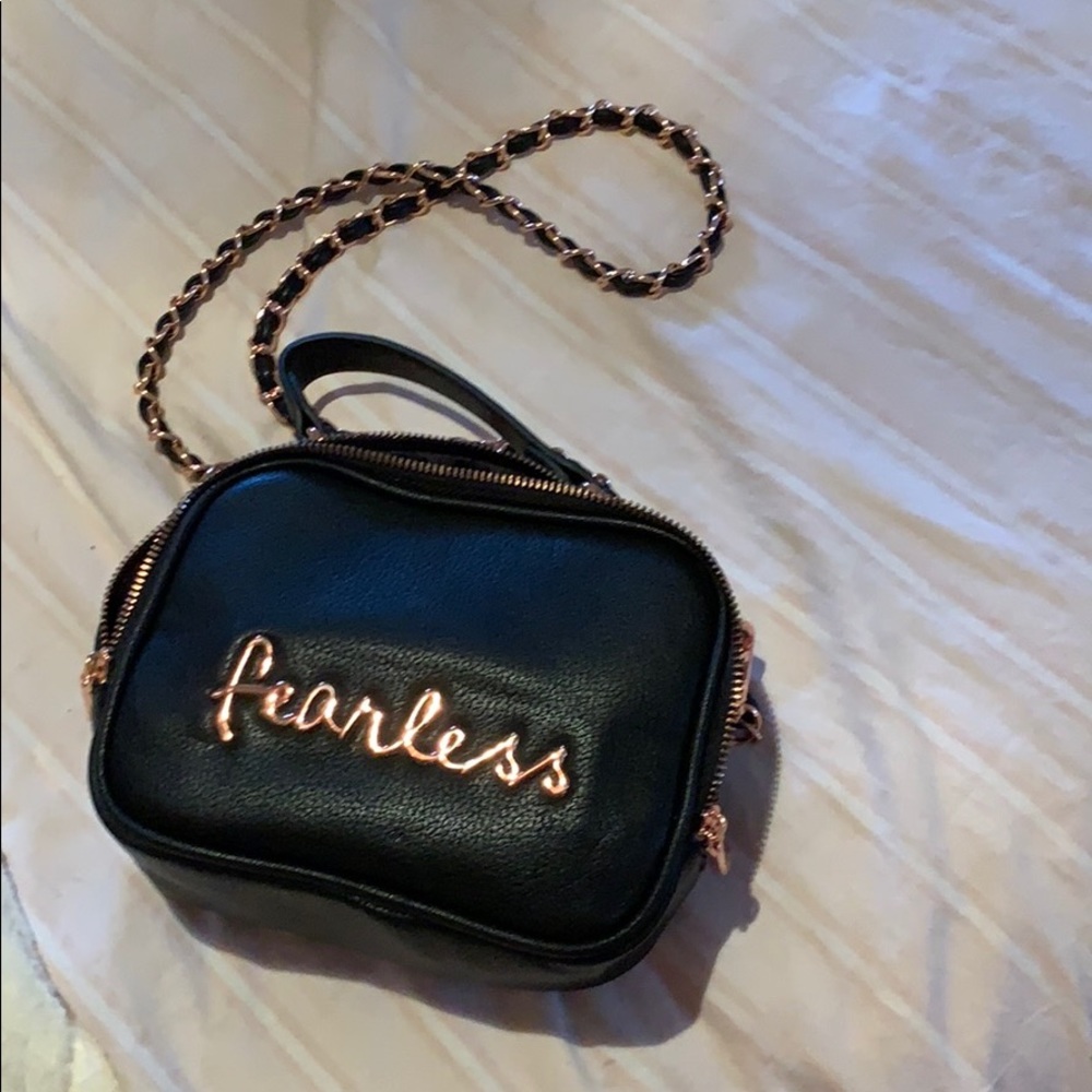 Black cross over bag with rose gold strap
